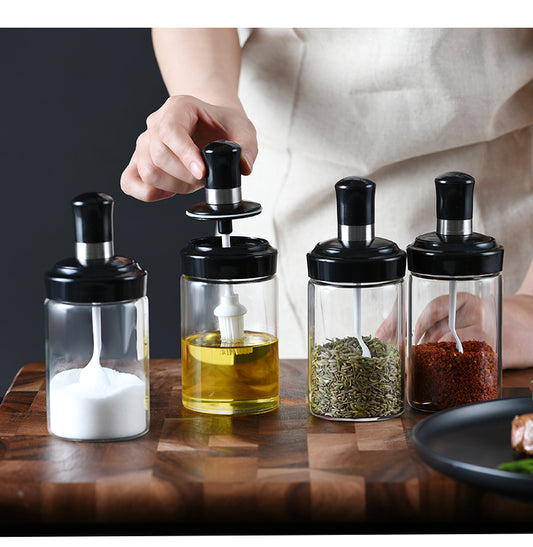 Glass container with brush/spoon